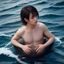 im体育用户足球迷李浩的头像，年轻男性戴着球队围巾热情洋溢